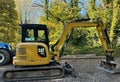 Miniexcavadora Caterpillar 305 E CR de 5 t usada de 2018 con 3502 h y cuchara de limpieza