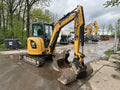 Miniexcavadora Caterpillar 303.5E CR de 3,58 t usada 2013 de 5 555 h con 3 cucharones