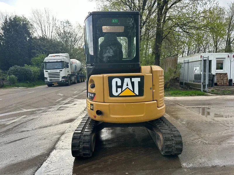 Miniexcavadora Caterpillar 303.5E CR de 3,58 t usada 2013 de 5 555 h con 3 cucharones