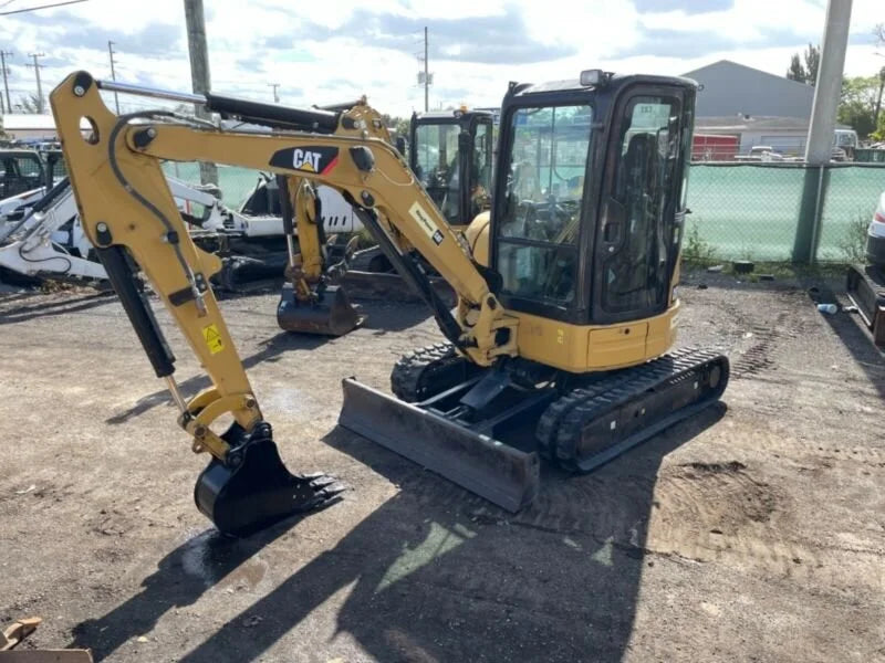 Miniexcavadora Caterpillar 303.5ECR 3,5 t usada 2015 cabina con aire acondicionado con 3 cucharones