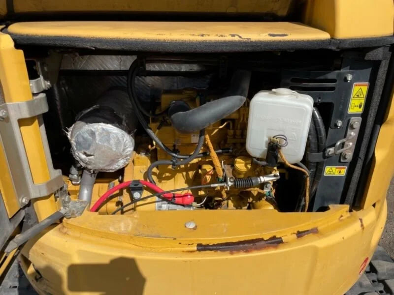 Miniexcavadora Caterpillar 303.5ECR 3,5 t usada 2015 cabina con aire acondicionado con 3 cucharones