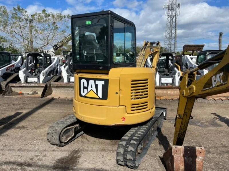 Miniexcavadora Caterpillar 303.5ECR 3,5 t usada 2015 cabina con aire acondicionado con 3 cucharones