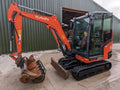 Miniexcavadora Kubota KX027-4 de 2,7 t usada 2017 cabina cerrada de 2341 h con 3 cucharones