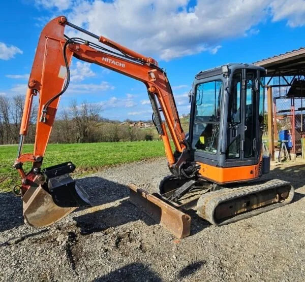 Miniexcavadora Kubota KX71-3 de 2,8 t usada de 2012 con 3480 h y enganche rápido hidráulico