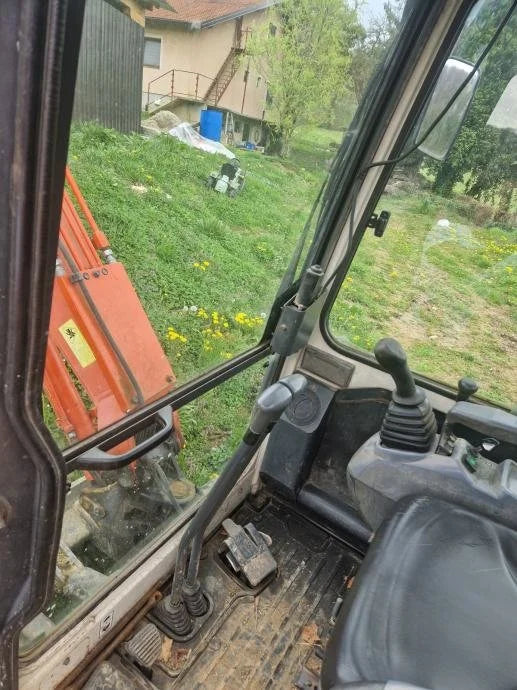Miniexcavadora Kubota U25-3 de 2,5 t de ocasión 2003 cabina cerrada de 3050 h con 3 cucharones