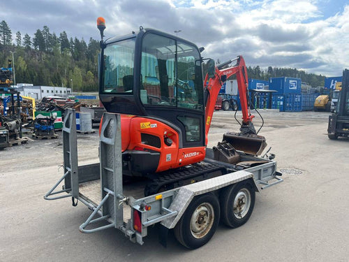 Kubota KX 019-4 + 3 Cucharas + Remolque – Miniexcavadora – 1,85T